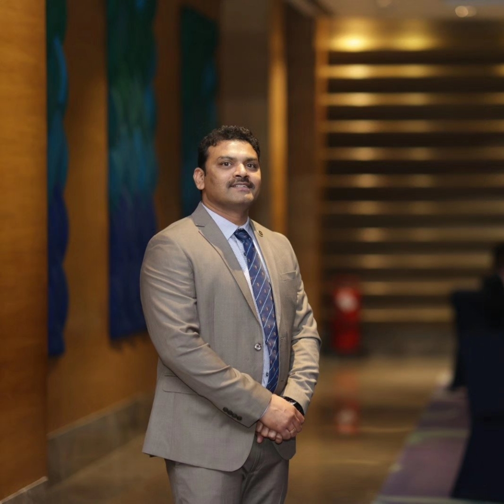 Dr. Suresh R